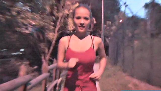 Busty teen jiggles her tits in public