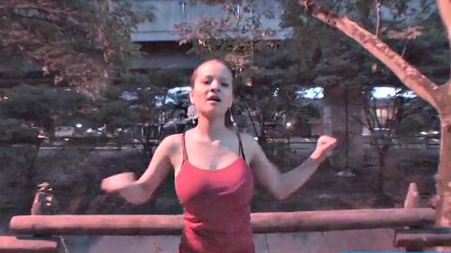 Busty teen jiggles her tits in public