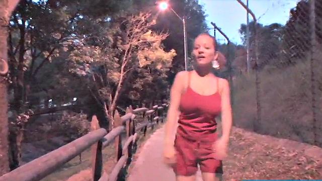 Busty teen jiggles her tits in public