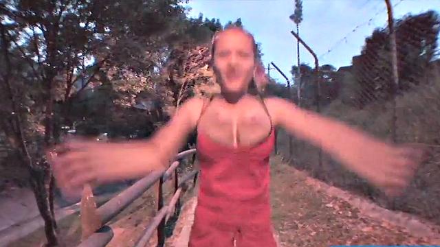Busty teen jiggles her tits in public
