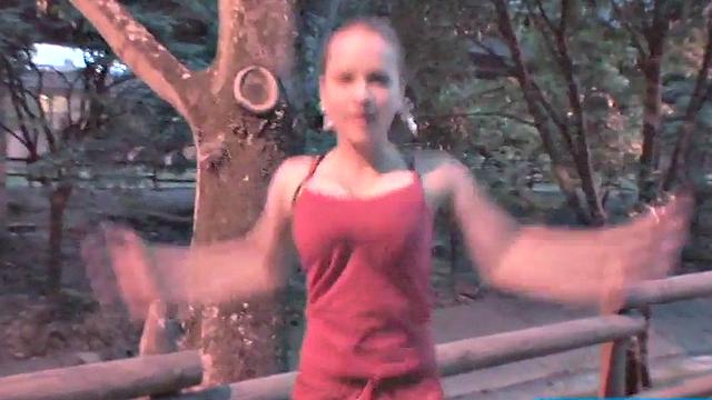 Busty teen jiggles her tits in public