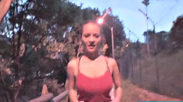 Busty teen jiggles her tits in public