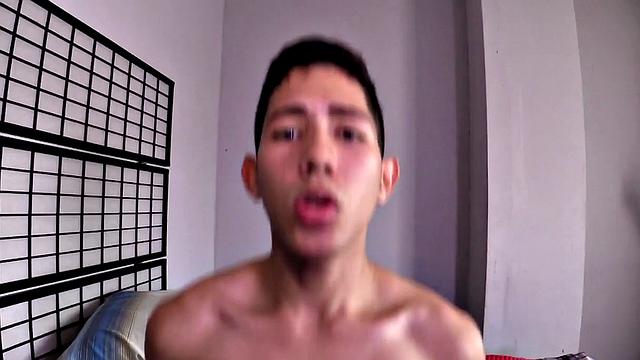 This cute Latin twink wants to please his daddy and starts by sucking his dick. Wearing only his shorts, the young man stands, strips naked and strokes his stiff cock, as daddy watches. Then he hops on daddy's waiting dick for a raw ride.