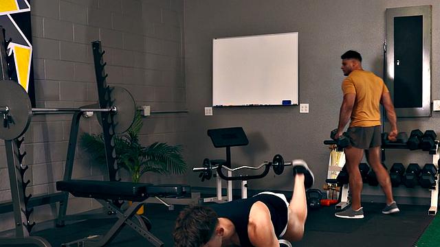 Athletic amateur barebacking in gym after workout