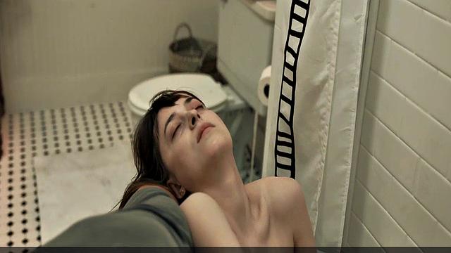 Dakota Johnson sexy in bath