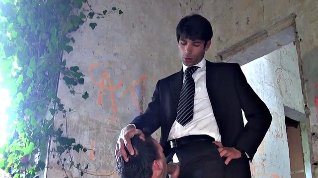 Suited top fucks bottom in jockstrap outdoor