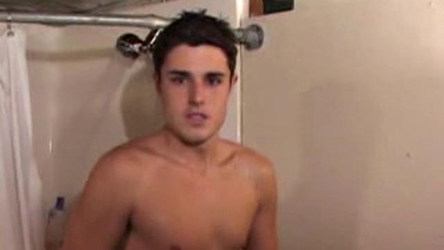 With the shower streaming down Hunter's naked body, he works up a boner and continues to stroke his hard cock, as he heads to the bedroom. After some determined self-pleasuring the young man blows his warm cum load.