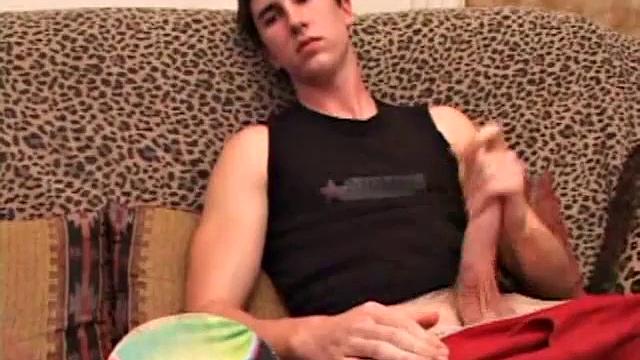 After returning from skateboarding JP pops in a porn video and begins stroking his cock. A little spit helps get it hard and he works his cock until he pumps out a nice load of warm cum onto his belly.