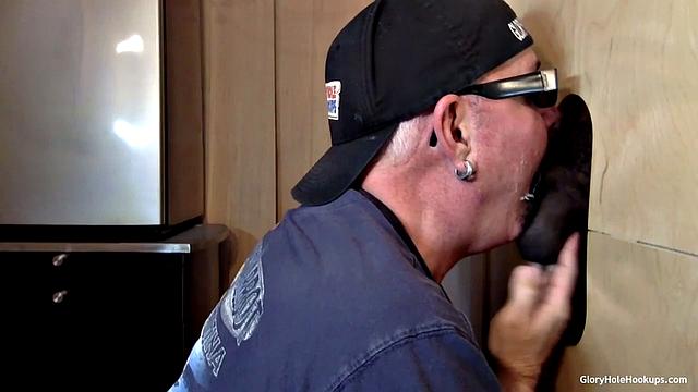 Suking Black Cock At the Glory Hole