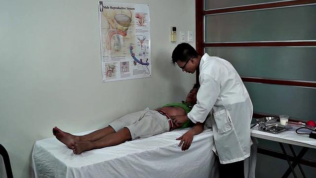 Gay doctor seduces Asian patient in medical room
