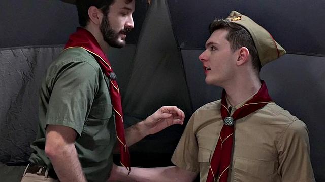 Uniformed scout fucks newbie under tent outdoors