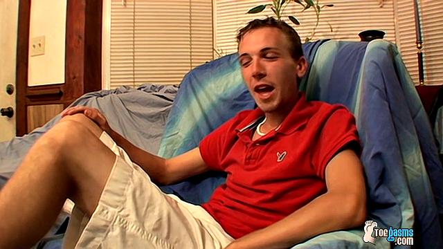 Aaron strokes his cock for the camera