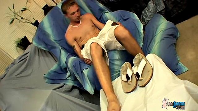 Aaron strokes his cock for the camera