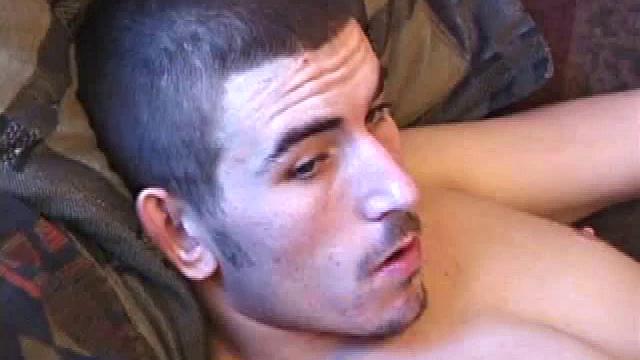 Sebastian fast forwards TV scenes while jerking off to find the right stimulation, then cums