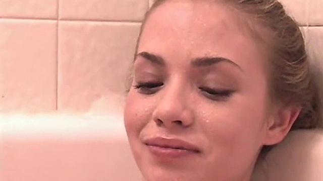 Cute April In Her Bathtub Plays Solo