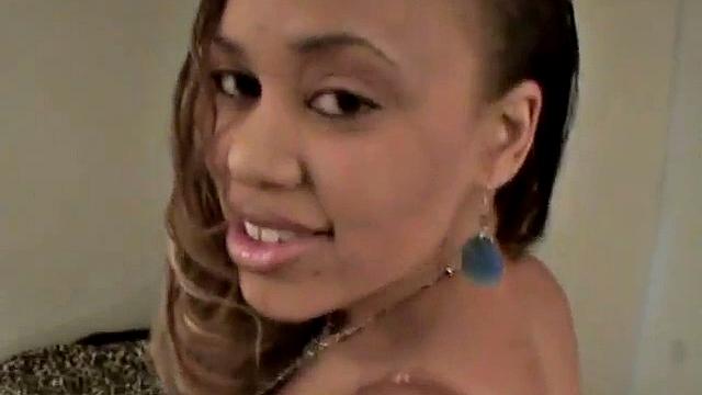 Masturbating ebony teen touches herself.