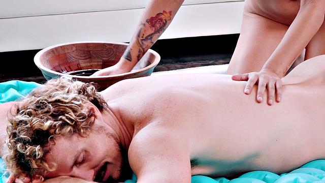 Perv inked masseuse facesitting client in 69 pose at massage