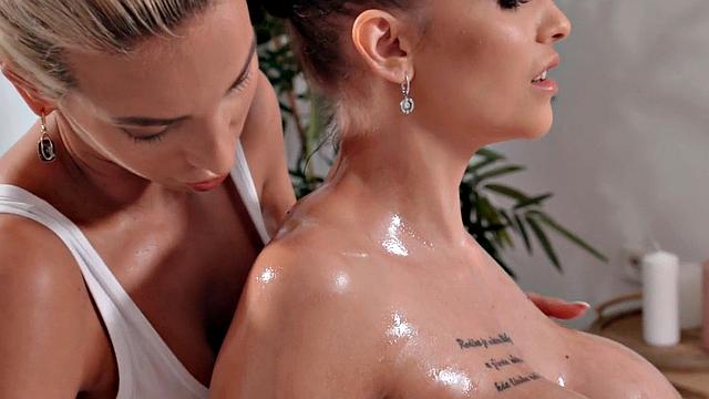 Oiled bigtitted dyke scissoring at erotic massage