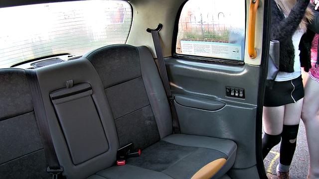 Big-titted babes share a cab & finger each other's wet pussies