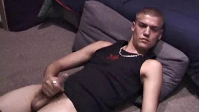 Lance is chilling while watching a porn, as he works up a boner. Some determined stroking causes a cum explosion onto Lance's shirt, which he quickly licks up.