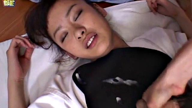 Doggystyled Japanese teen gets wet with finger.