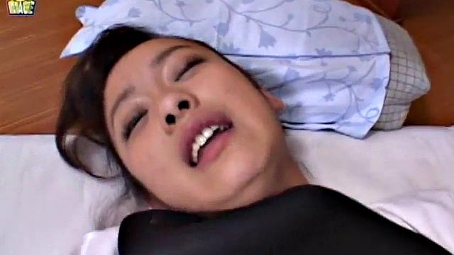 Doggystyled Japanese teen gets wet with finger.