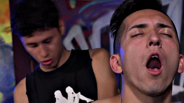 The club is empty and Latinos Dimitri and Ethan find themselves alone and horny. Ethan drops his pants and bends over for some butt slapping, and hole fingering, before Dimitri pulls out his big cock and feeds it to him.