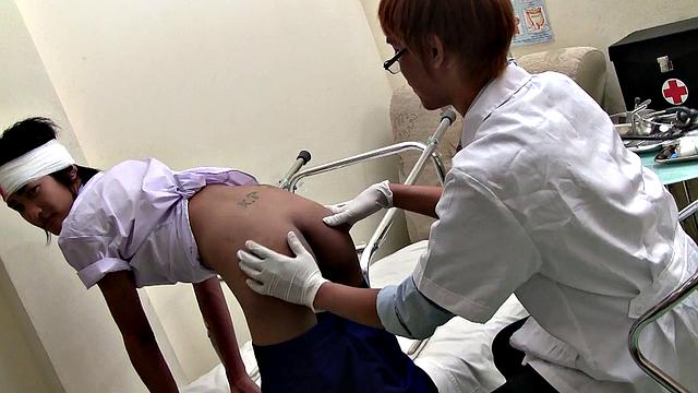 Pissing Asian twink enjoys bareback sex with doctor