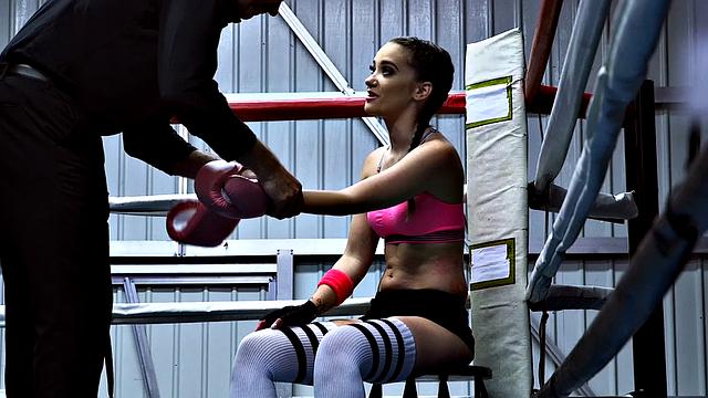 Brunette boxing slut takes a hard pounding in the ring