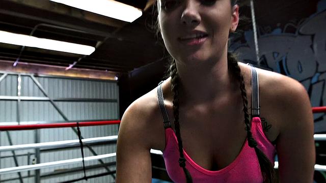 Brunette boxing slut takes a hard pounding in the ring