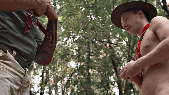 Inked gaydaddy fucks bottom twink in tent outdoor