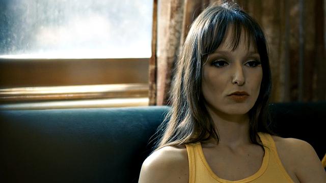 Cocksucking babe in stockings bounces on hard cock