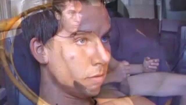 Brocks pops in a porn video and starts to strip. The man sports a hard cock, stroking it before exploding on his face and chest.