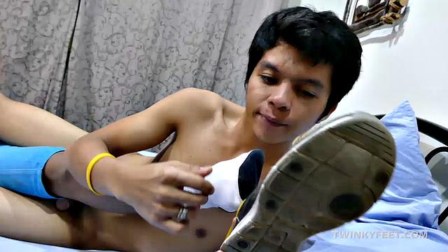This kinky twinky Asian boy Russel loves having his feet serviced. George is with cute little Russel today for some hot male feet sex. With plenty of boy feet worship and toe sucking, the Asian boys grow increasingly horny.