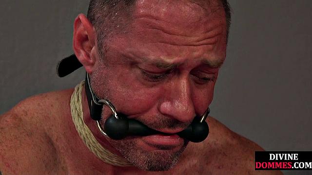 Rope dominatrix whippin tied person