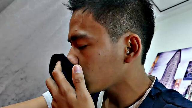 This boy next door type of Asian twink tries to not jerk off so much by listening to some tunes. But he's got such an obsession with male feet fetish, nothing can keep his mind off of it.