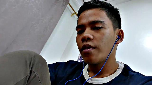 This boy next door type of Asian twink tries to not jerk off so much by listening to some tunes. But he's got such an obsession with male feet fetish, nothing can keep his mind off of it.