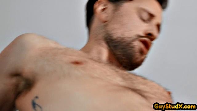 Tattooed stud analfucking his horny lover