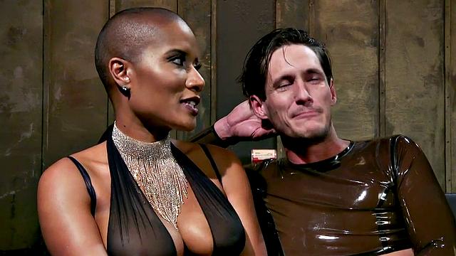 Nubian domina whips blindfolded sub in BDSM pleasure