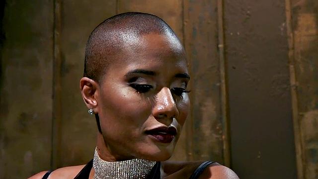 Nubian domina whips blindfolded sub in BDSM pleasure