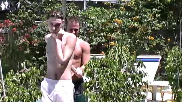Skinny twink Ty Whitney and redhead Corbin Michaels take a dip in the pool, followed by a super hot suck and fuck session at pool side.