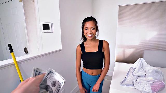 A tattooed Asian maid's perky boobs bounce as she gets her trimmed pussy drilled from behind