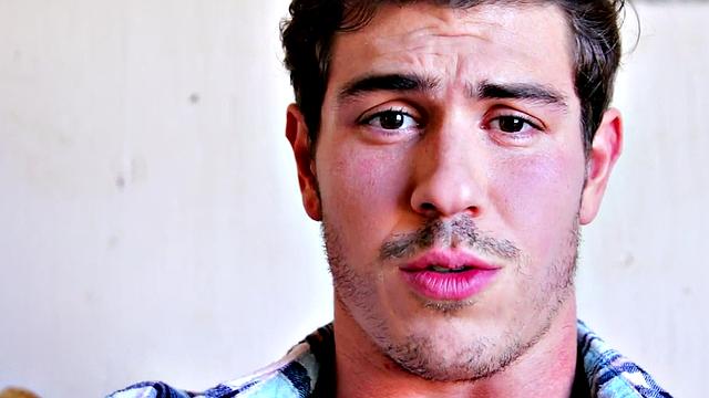 Shaved hunk shoots cum after jerking on farm