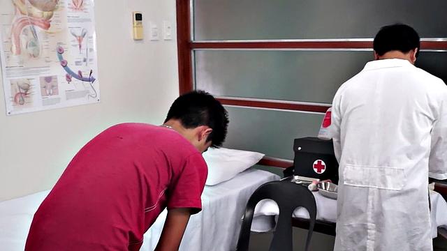 Hairy Asian twink asstoyed by doctor with enema process