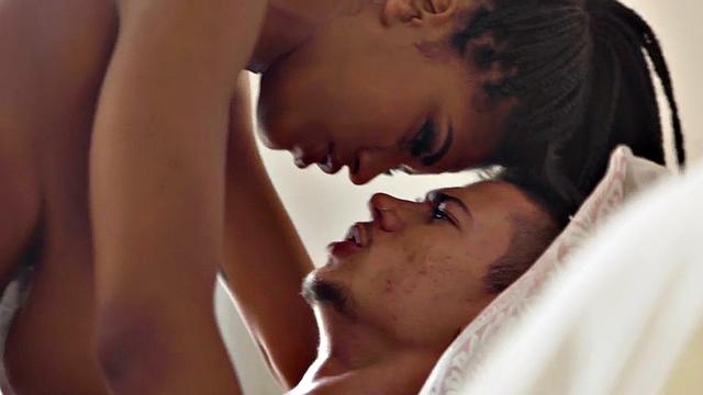 Busty tattooed Ebony MILF with big jugs rides BF