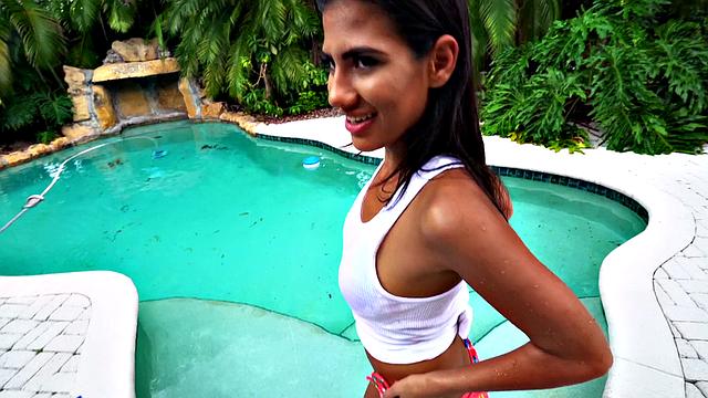 Latina gets her bald pussy drilled in pool by lucky dude