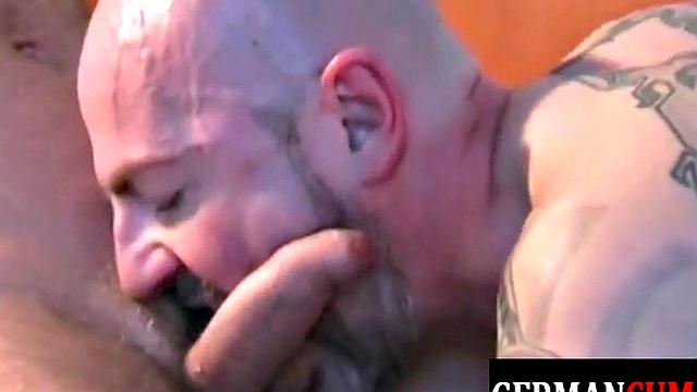 German hunk with ink gets down and dirty with a hot jock & gets a cumshot