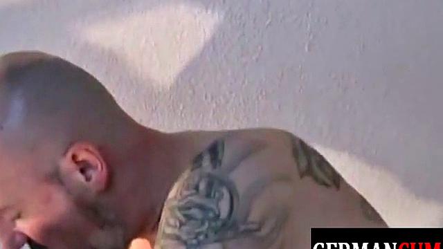 German hunk with ink gets down and dirty with a hot jock & gets a cumshot
