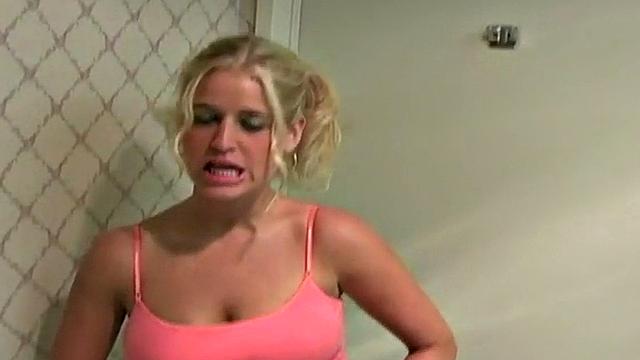 Busty blonde teen gives a handjob