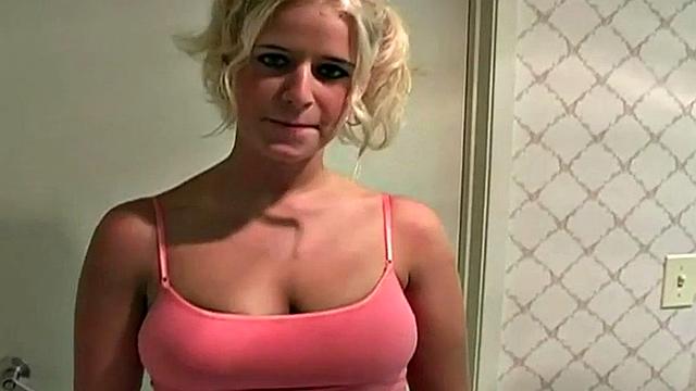 Busty blonde teen gives a handjob